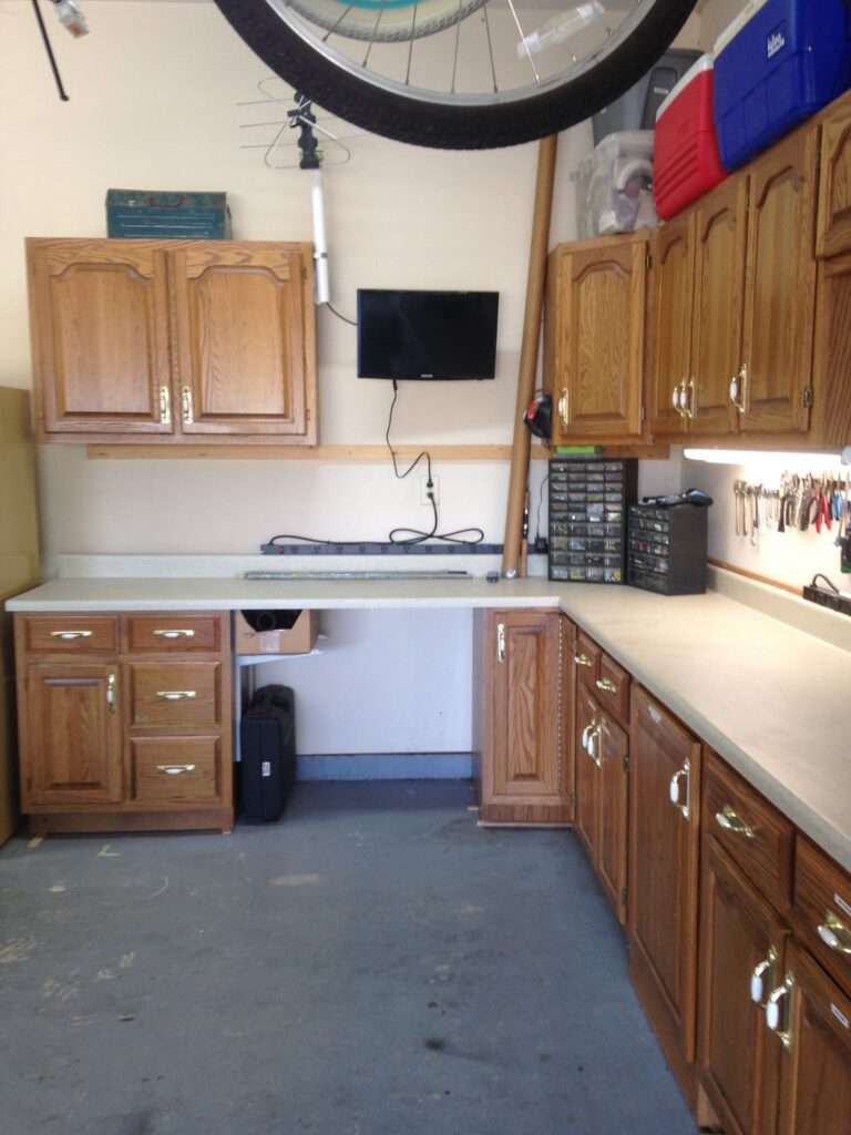 Full view of cabinets in a clean garage.