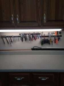 Organized tool storage in a garage.
