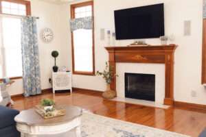 Living room showing the décor around the fireplace