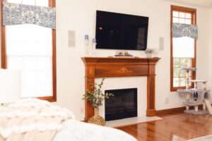 Living room showing the décor around the fireplace